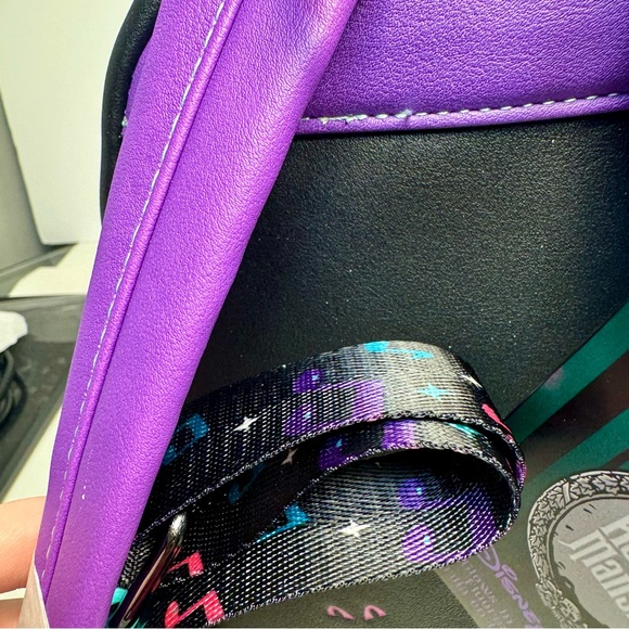 NWT. Loungefly Disney\'s The Haunted Mansion Madame Leota Mini Backpack glows main image 9